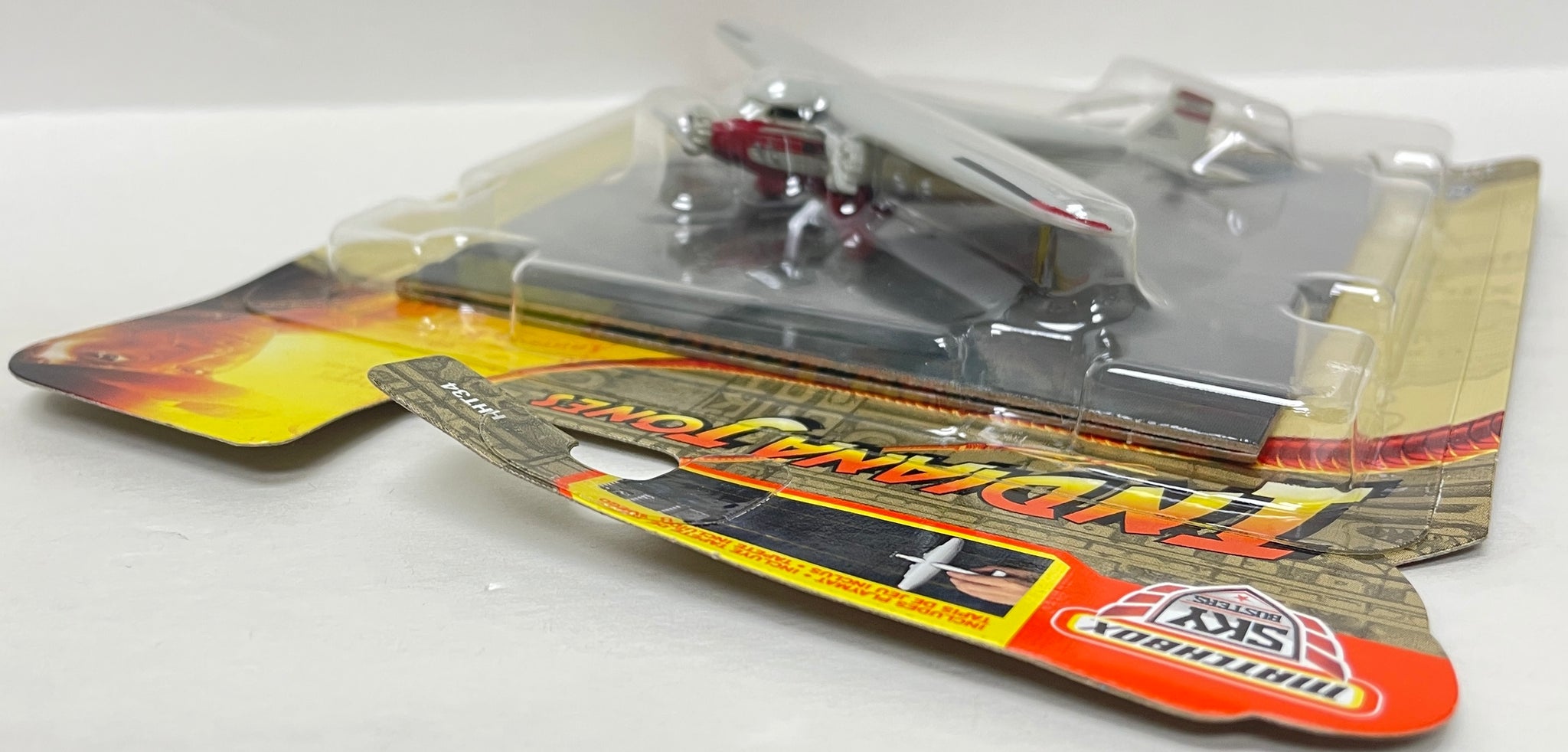 Avion Matchbox Sky Busters Indiana Jones Ford Tri-Moteur - Avec Tapis De Jeu, Neuf Sur Carte