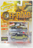 Johnny Lightning FF Road 'Four-High' die-cast toy car in its original blister packaging, featuring an olive green and black Toyota truck with a roof rack.